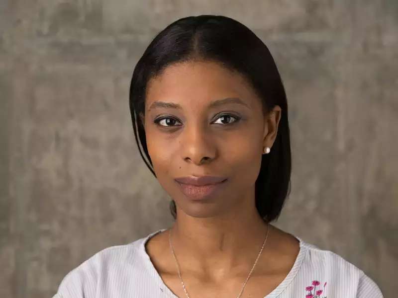Headshot of Abbesi Akhamie