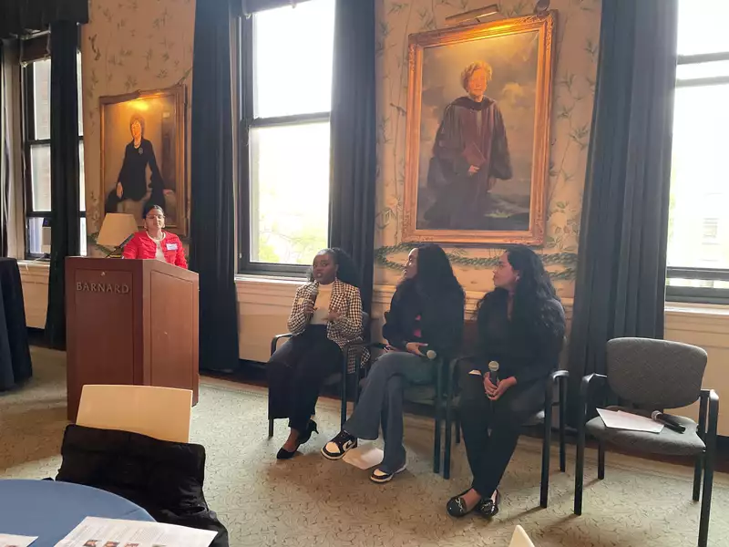 [Image description: Deepti Sharma and 3 Athena entrepreneurs at the Athena Entrepreneurship Showcase.]